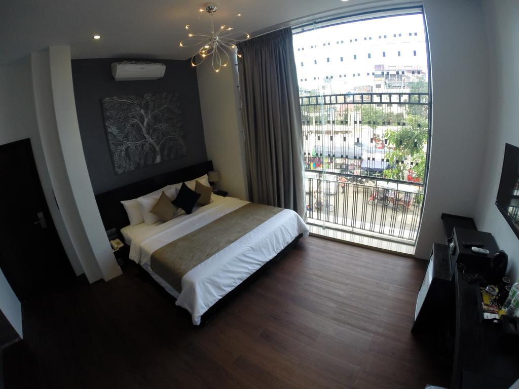 De Art Hotel Phnom Penh Habitación foto